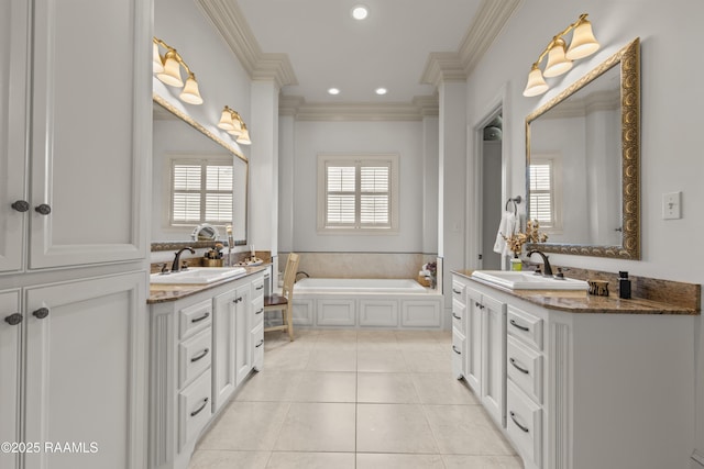407 Arabella Blvd, Lafayette, LA 70508 - full bath featuring two vanities, ornamental molding, a bath, recessed lighting, and tile patterned flooring