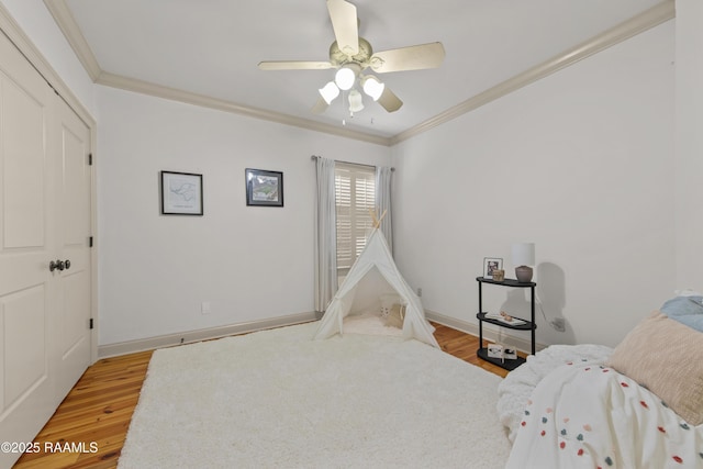 407 Arabella Blvd, Lafayette, LA 70508 - bedroom with light wood finished floors, ornamental molding, and ceiling fan