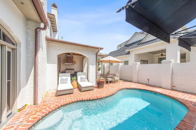 407 Arabella Blvd, Lafayette, LA 70508 - view of pool with a ceiling fan, a patio, area for grilling, and a bar