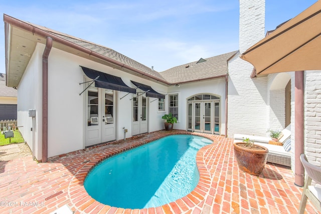 407 Arabella Blvd, Lafayette, LA 70508 - outdoor pool featuring french doors and a patio area