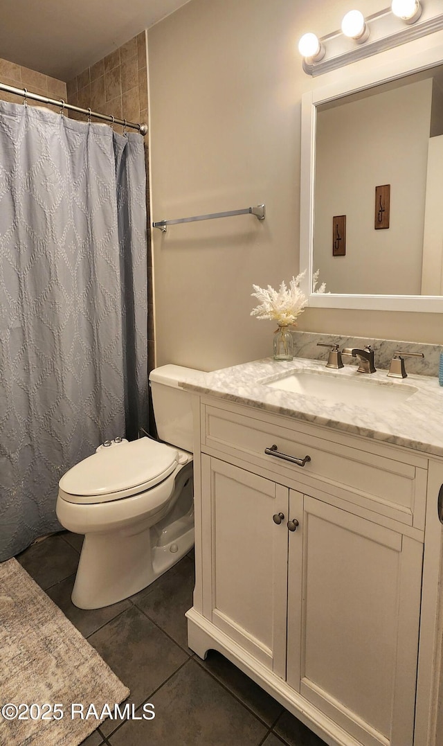 106 Paris St, Lafayette, LA 70506 - full bath with vanity, tile patterned floors, and a shower with shower curtain