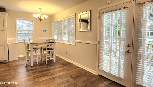 106 Paris St, Lafayette, LA 70506 - dining room with a chandelier and dark wood-style floors