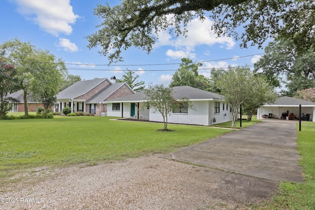 209 Sandager Ave, Jeanerette, LA 70544 - ranch-style home with concrete driveway and a front yard