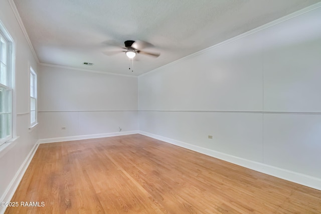 707 Compton St, New Iberia, LA 70560 - spare room with a ceiling fan, crown molding, and light wood finished floors