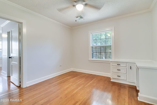 707 Compton St, New Iberia, LA 70560 - unfurnished room with light wood-style floors, ceiling fan, ornamental molding, and a textured ceiling