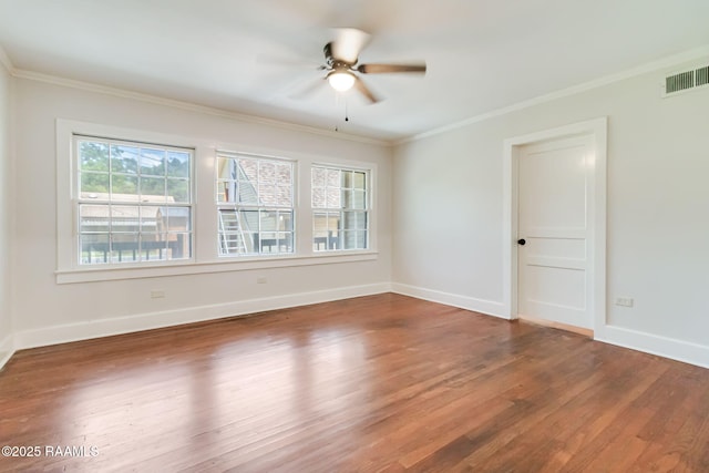 707 Compton St, New Iberia, LA 70560 - spare room featuring ornamental molding, wood finished floors, and ceiling fan