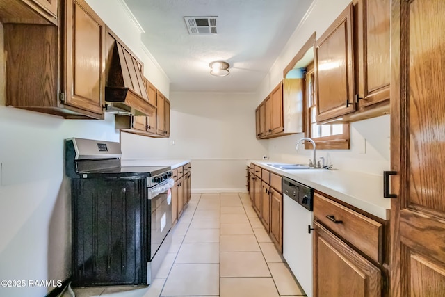 707 Compton St, New Iberia, LA 70560 - kitchen featuring electric stove, dishwasher, brown cabinetry, light countertops, and light tile patterned flooring