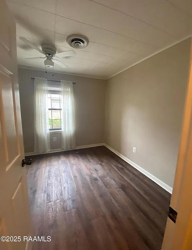 1317 N N Elton Ct, Lake Charles, LA 70607 - spare room featuring dark wood-style floors, ceiling fan, and crown molding