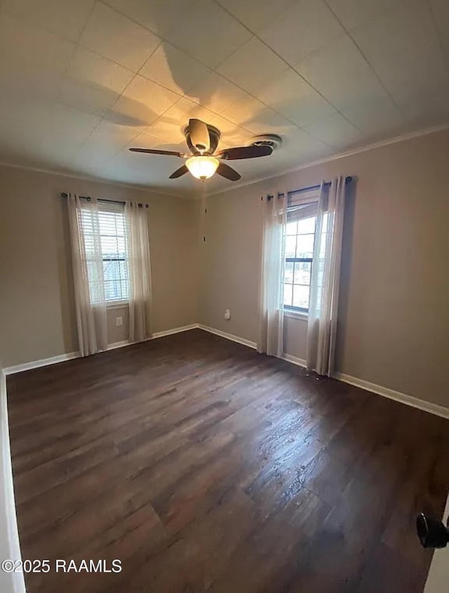 1317 N N Elton Ct, Lake Charles, LA 70607 - spare room with healthy amount of natural light, crown molding, dark wood finished floors, and ceiling fan