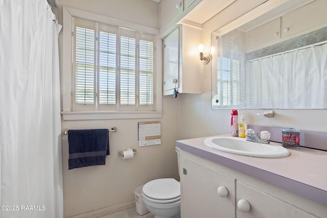 701 Ledoux St, Jennings, LA 70546 - bathroom with vanity and a shower with curtain
