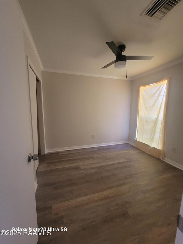 117 Luna St, Lafayette, LA 70506 - empty room featuring crown molding, dark wood-style flooring, and a ceiling fan