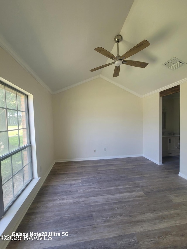 117 Luna St, Lafayette, LA 70506 - spare room featuring vaulted ceiling, ceiling fan, dark wood-style flooring, and crown molding