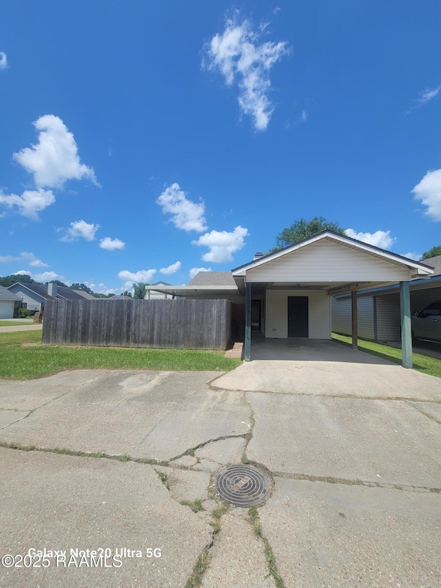 117 Luna St, Lafayette, LA 70506 - view of front of property with concrete driveway and a carport