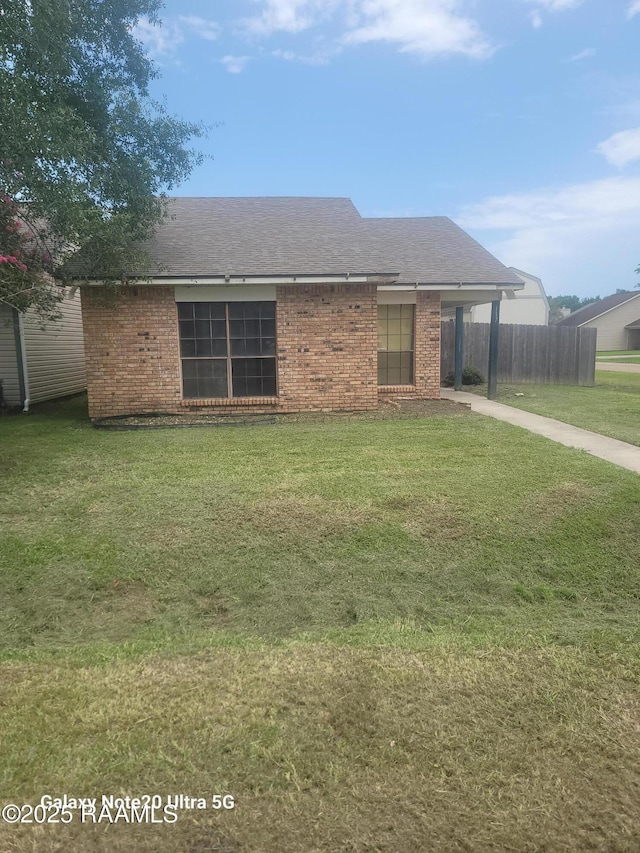 117 Luna St, Lafayette, LA 70506 - view of front of home featuring a shingled roof and brick siding