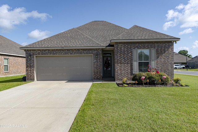100 Rose Of Sharon Ln, Lafayette, LA 70508 - view of front of house with roof with shingles, brick siding, a garage, concrete driveway, and a front lawn