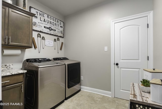 100 Rose Of Sharon Ln, Lafayette, LA 70508 - laundry room featuring washer and clothes dryer and cabinet space
