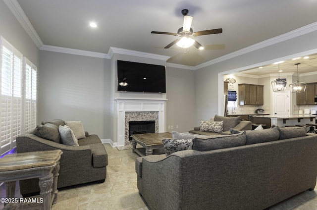 100 Rose Of Sharon Ln, Lafayette, LA 70508 - living room with a ceiling fan, a premium fireplace, and crown molding