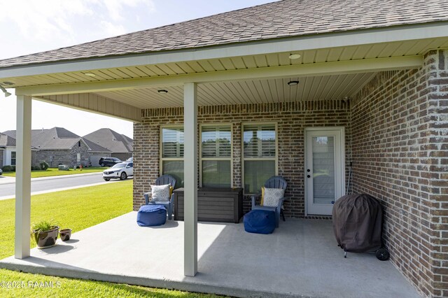 100 Rose Of Sharon Ln, Lafayette, LA 70508 - view of patio featuring a grill