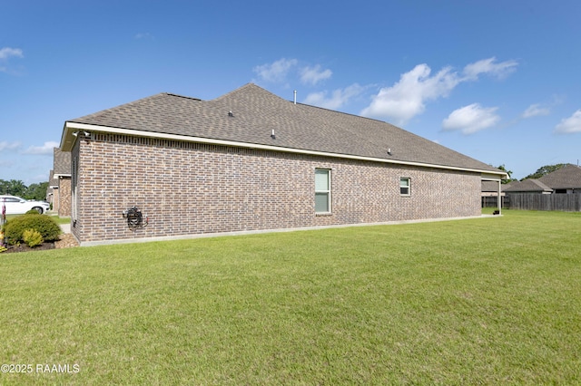 100 Rose Of Sharon Ln, Lafayette, LA 70508 - back of property featuring brick siding and roof with shingles