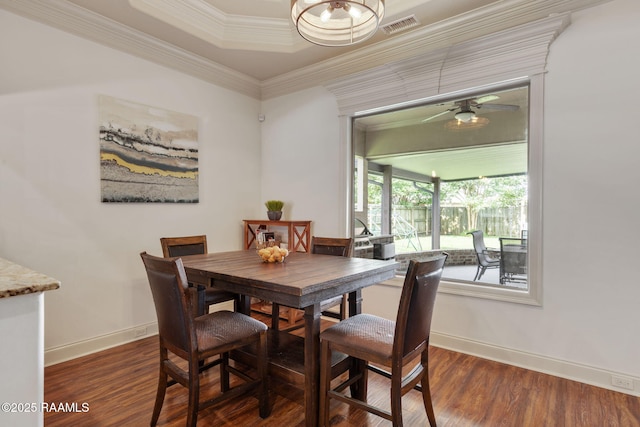 103 Majestic Oaks Dr, Broussard, LA 70518 - dining space with wood finished floors, crown molding, and ceiling fan
