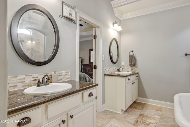103 Majestic Oaks Dr, Broussard, LA 70518 - ensuite bathroom featuring backsplash, ornamental molding, two vanities, and a soaking tub