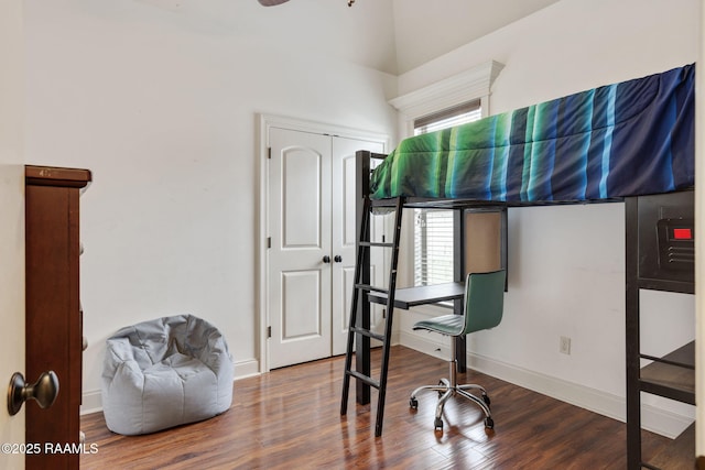 103 Majestic Oaks Dr, Broussard, LA 70518 - bedroom with multiple windows, wood finished floors, high vaulted ceiling, a desk, and a closet