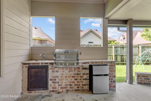103 Majestic Oaks Dr, Broussard, LA 70518 - view of patio with area for grilling and a sink