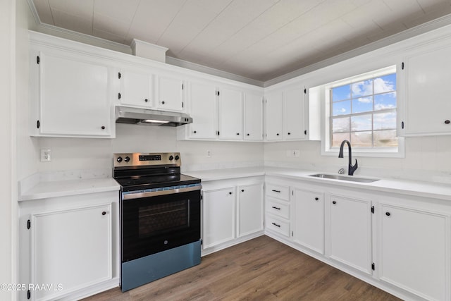 189 Jeremy Rd, Opelousas, LA 70570 - kitchen featuring under cabinet range hood, stainless steel electric range oven, white cabinets, dark wood-type flooring, and crown molding