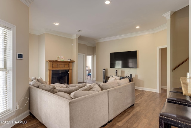 742 Hummingbird Ln, New Iberia, LA 70563 - living room with wood finished floors, crown molding, recessed lighting, and a fireplace