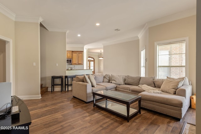 742 Hummingbird Ln, New Iberia, LA 70563 - living area featuring dark wood-style floors, crown molding, recessed lighting, and a chandelier
