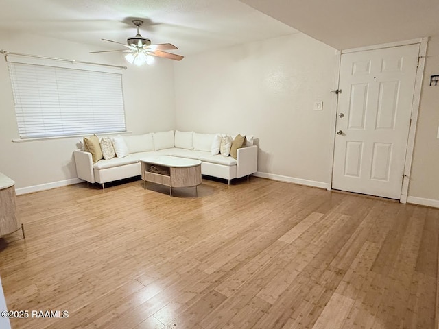 3121 Johnston St Unit 207, Lafayette, LA 70503 - living room featuring light wood finished floors and ceiling fan