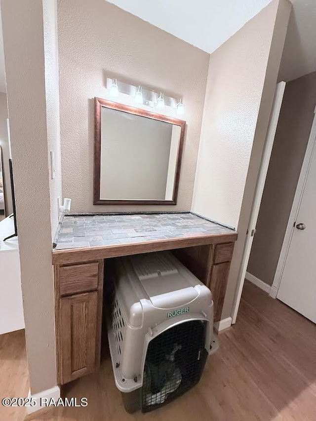 3121 Johnston St Unit 207, Lafayette, LA 70503 - bathroom featuring wood finished floors