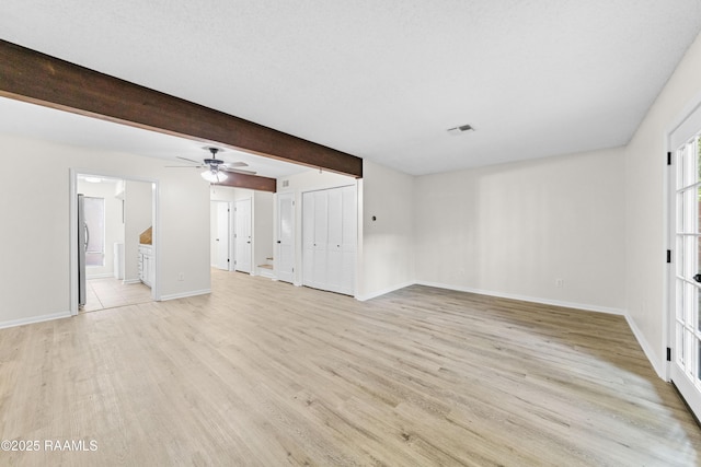 313 Sidney Martin Rd, Lafayette, LA 70507 - unfurnished living room featuring light wood finished floors and ceiling fan