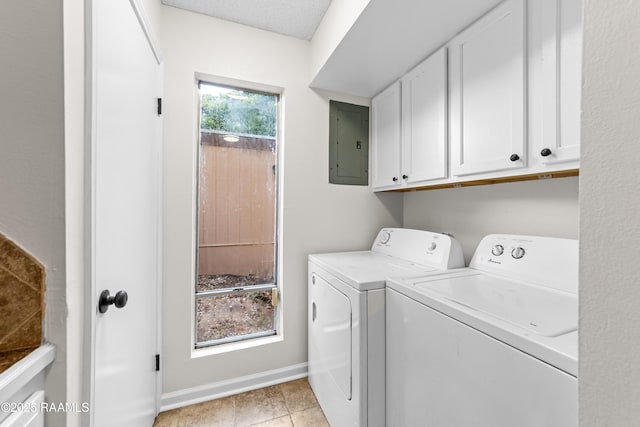 313 Sidney Martin Rd, Lafayette, LA 70507 - laundry area with electric panel, cabinet space, washer and clothes dryer, and light tile patterned flooring