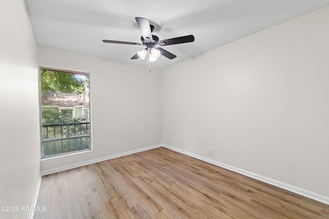 313 Sidney Martin Rd, Lafayette, LA 70507 - unfurnished room featuring wood finished floors, a ceiling fan, and a textured ceiling