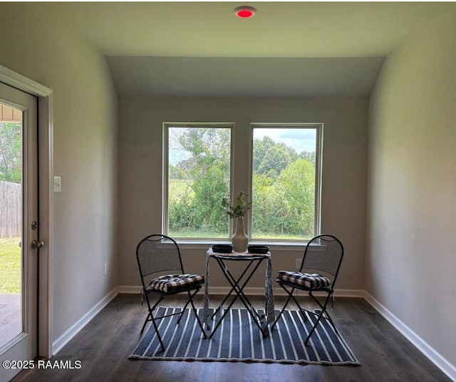 205 Acadian Lake Dr, Duson, LA 70529 - living area featuring dark wood finished floors and baseboards