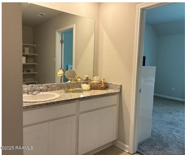 205 Acadian Lake Dr, Duson, LA 70529 - bathroom with vanity and baseboards