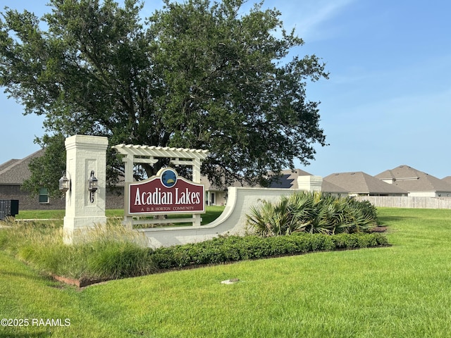 205 Acadian Lake Dr, Duson, LA 70529 - community sign featuring a lawn