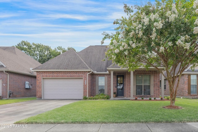 201 Spanish Moss Ln, Broussard, LA 70518 - view of front of property with a garage, concrete driveway, brick siding, a front lawn, and a shingled roof