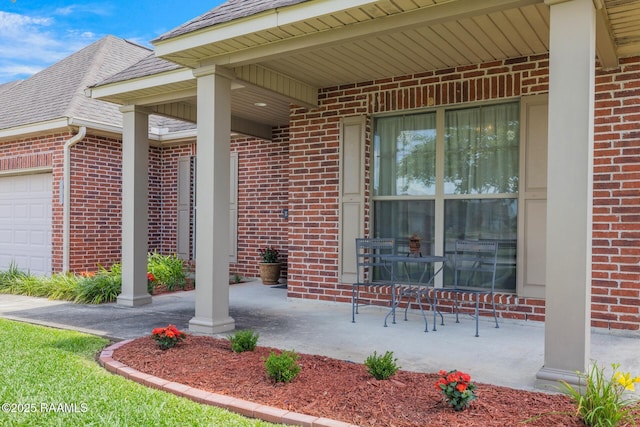 201 Spanish Moss Ln, Broussard, LA 70518 - entrance to property with brick siding, roof with shingles, and an attached garage