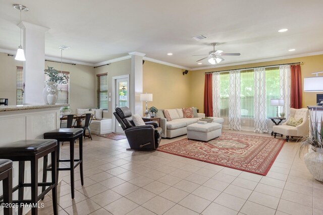 201 Spanish Moss Ln, Broussard, LA 70518 - living area with healthy amount of natural light, recessed lighting, ceiling fan, light tile patterned flooring, and crown molding