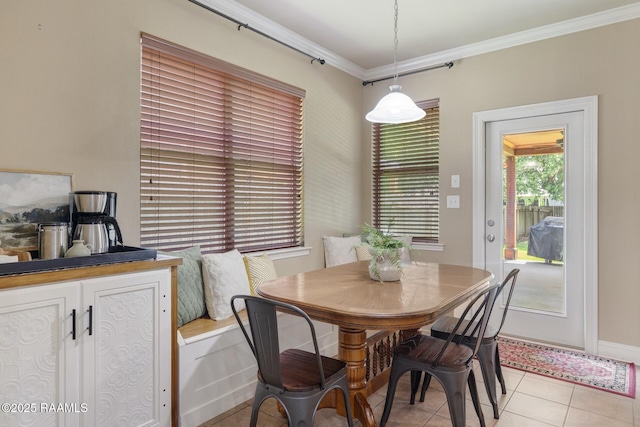 201 Spanish Moss Ln, Broussard, LA 70518 - dining area featuring light tile patterned flooring and ornamental molding