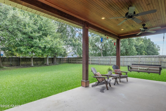 201 Spanish Moss Ln, Broussard, LA 70518 - fenced backyard featuring a ceiling fan and a patio