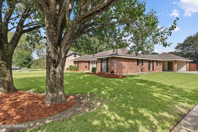 122 Thrush Loop, Lafayette, LA 70508 - ranch-style house with brick siding and a front lawn