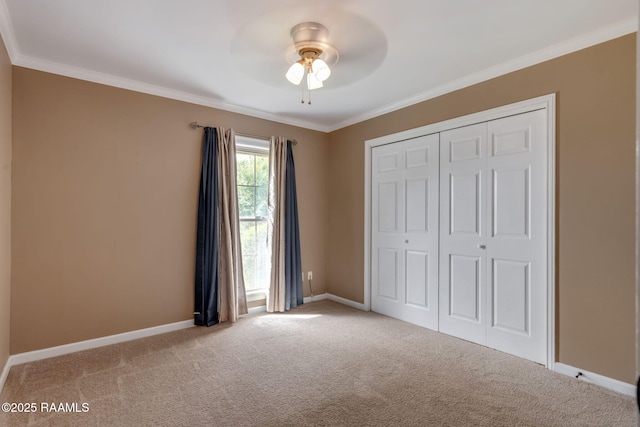 122 Thrush Loop, Lafayette, LA 70508 - unfurnished bedroom with ornamental molding, carpet flooring, a closet, and a ceiling fan