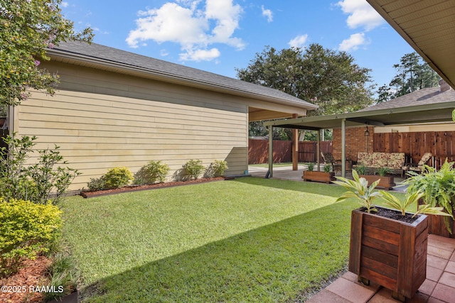 122 Thrush Loop, Lafayette, LA 70508 - view of yard featuring a patio