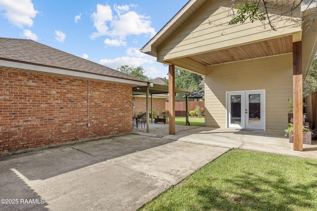 122 Thrush Loop, Lafayette, LA 70508 - view of patio / terrace featuring french doors