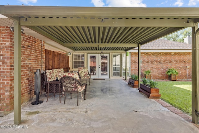 122 Thrush Loop, Lafayette, LA 70508 - view of patio / terrace with french doors