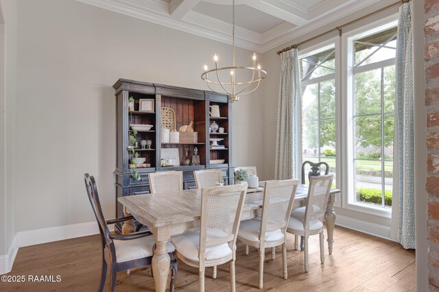 301 Gleneagles Cir, Broussard, LA 70518 - dining area with ornamental molding, a chandelier, coffered ceiling, light wood-style flooring, and beam ceiling