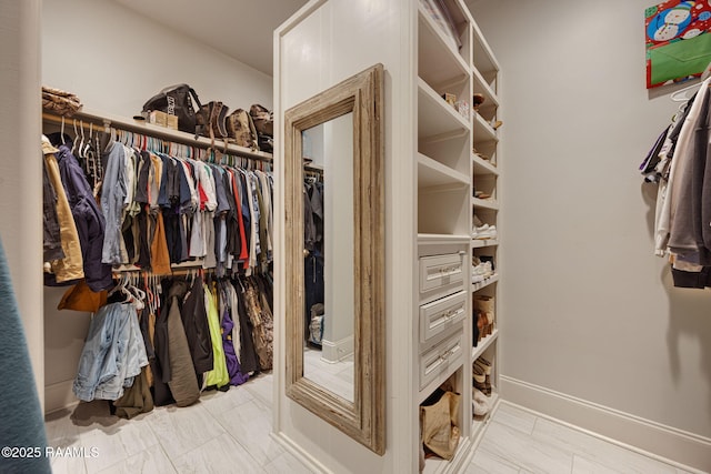 301 Gleneagles Cir, Broussard, LA 70518 - walk in closet featuring marble finish floors